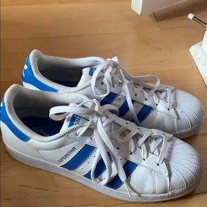 blue and white adidas superstars